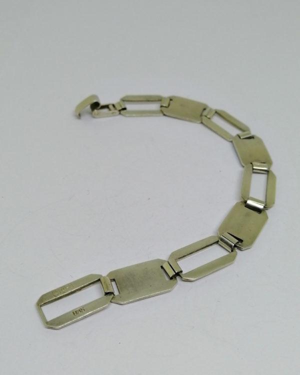 bracelet argent maillon rectangulaire et certains émaillés vers 1925.