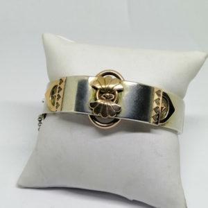 bracelet argent bicolore avec motif central vers 1900.