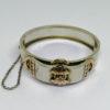 bracelet argent jonc bicolore avec motif central, vers 1900.