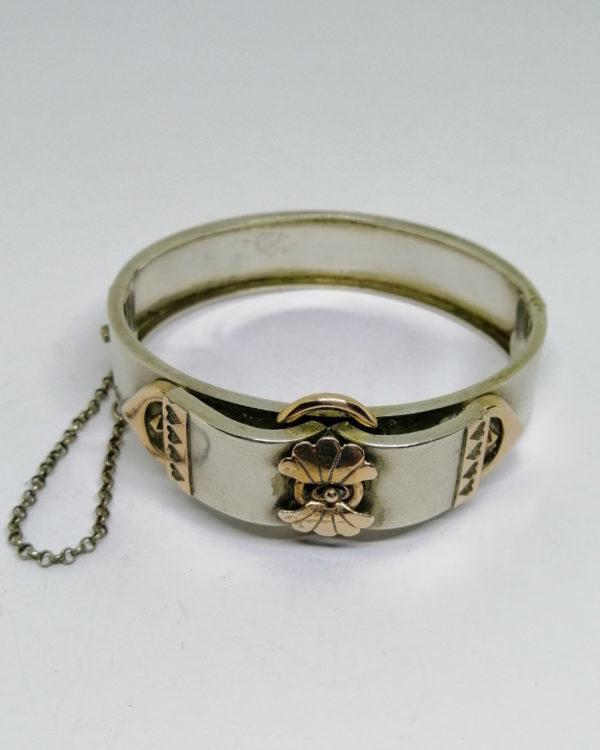 bracelet argent jonc bicolore avec motif central, vers 1900.