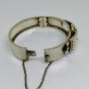 bracelet argent jonc bicolore, avec motif central, vers 1900.