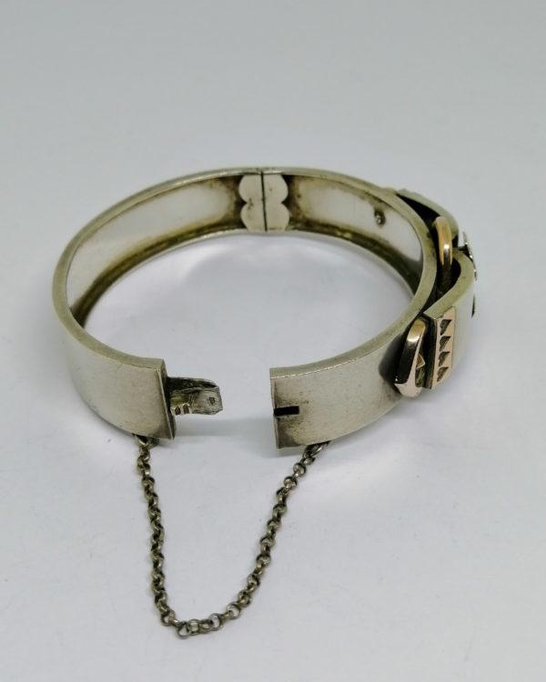 bracelet argent jonc bicolore, avec motif central, vers 1900.