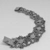 bracelet argent avec maillon en forme de fleur filigrané, vers 1920-30