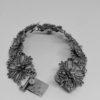 bracelet argent avec maillon en forme de fleur filigrané, vers 1920-30.