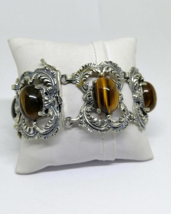 bracelet argent avec gros cabochons d'oeil de tigre vers 1920-30.