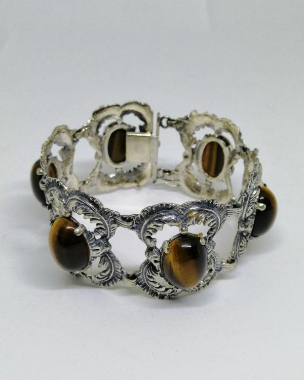 bracelet argent avec gros cabochons d'oeil de tigre vers 1920-30.