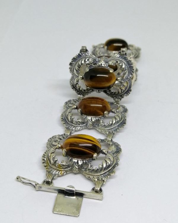 bracelet argent avec gros cabochons d'oeil de tigre vers 1920-30.