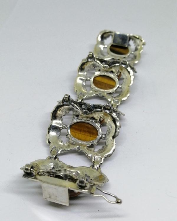 bracelet argent avec gros cabochons d'oeil de tigre vers 1920-30.