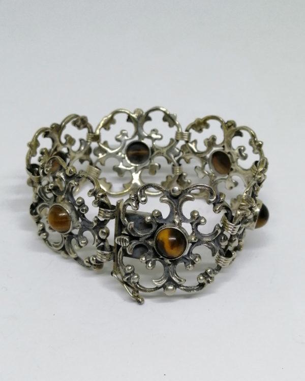 bracelet argent avec maillons ajourés et sertie de cabochon de pierre naturelle vers 1920-30.