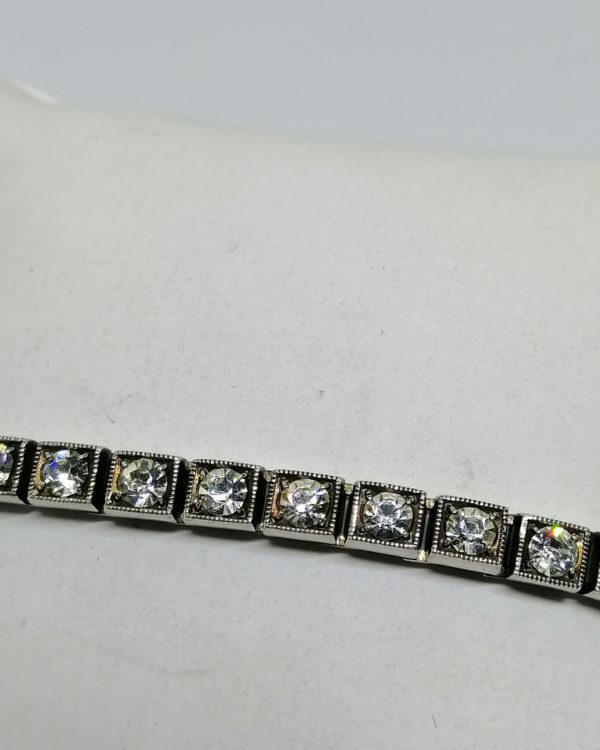 bracelet argent avec sertie de pierres façon rivière vers 1930.