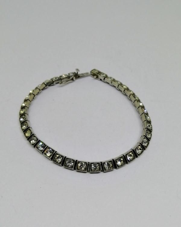 bracelet argent avec sertie de pierres façon rivière vers 1930