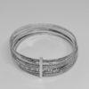 bracelet argent semainier, avec décors végétaux, et frises vers 1920.