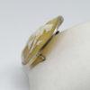 broche argent avec camée coquillage sur fond beige et représentant une scène à l'antique vers 1880.