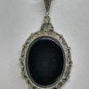 pendentif argent avec onyx et marcasites vers 1925.