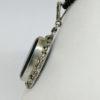 pendentif argent avec onyx cabochon et pavage de marcasites vers 1925.