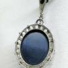 pendentif argent avec onyx cabochon et pavage de marcasites vers 1925.