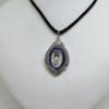 pendentif argent avec cerclage en émail et pampille avec perle baroque vers 1900, art nouveau.