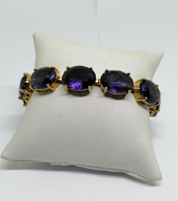 Bracelet souple avec Améthystes d'imitations, de la marque Monet.