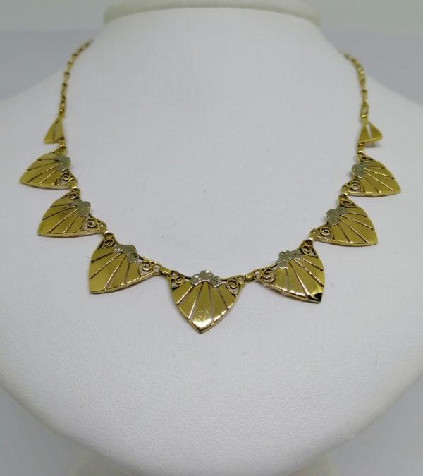Collier or bicolore, motif géométrique Art Déco, vers 1925.