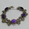 Bracelet argent, motif d'inspiration Bretonne et cabochon ovale d'améthyste, signé.
