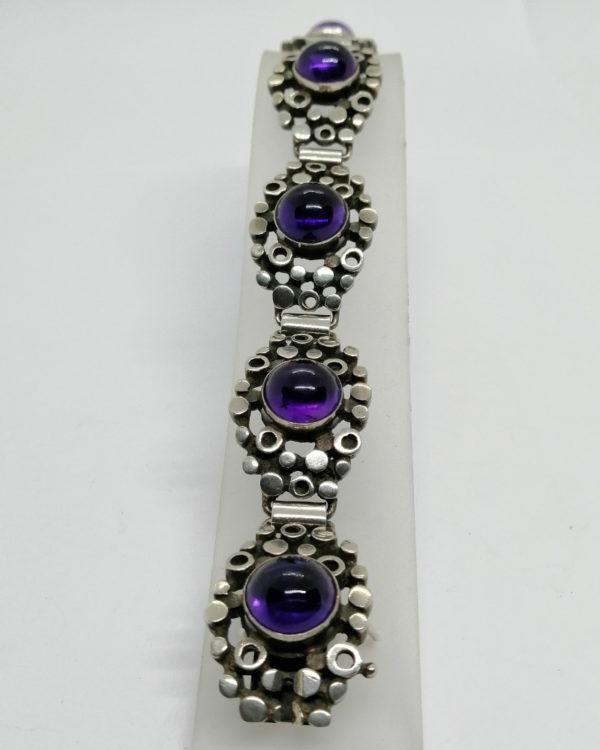 Bracelet argent, maille ajourée et cabochon rond d'améthyste, Art Déco.