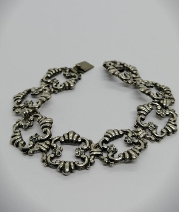 Bracelet argent, maillon ajouré et travaillé, signé WMF, Allemagne vers 1900-25.