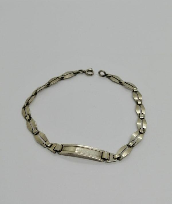 Bracelet argent, petite gourmette avec plaque, époque Art Déco, vers 1930.