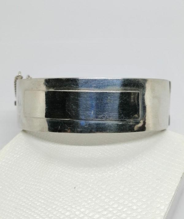 Bracelet argent, jonc plat et large, neutre de décor, orfèvre Parisien, vers 1900-20.