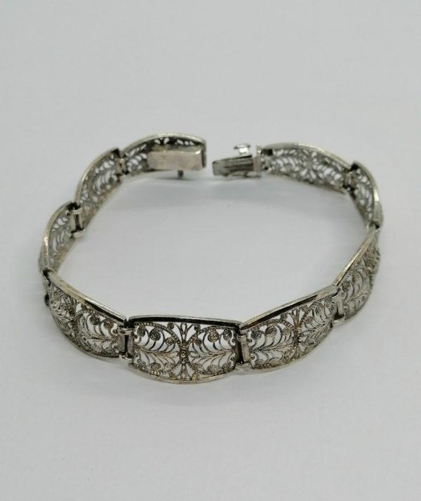 Bracelet argent, maillon filigrané motif stylisé, vers 1930.