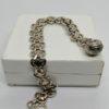 Bracelet argent, maille plate ajourée et bicolore, avec breloque, Paris. – Image 2