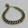 Bracelet argent , maille gourmette creuse et motif façon imprimé, vers 1900.