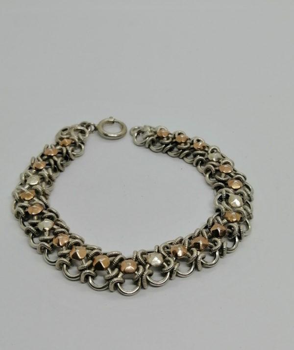 Bracelet argent, maille ancienne avec plaquettes d'or rosé, Paris vers 1900-20.