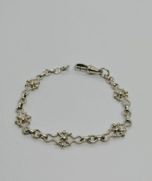 Bracelet argent, maille original et goupillon, vers 1920.
