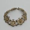 Bracelet argent, vermeil, motif de fleur entièrement filigrané, 1920.