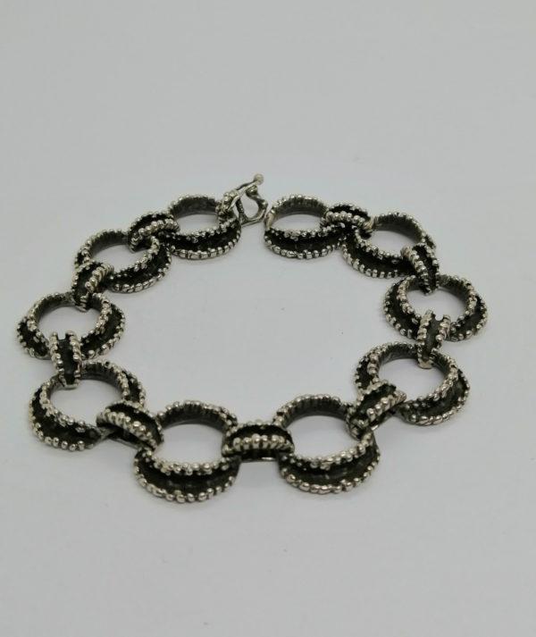 Bracelet argent, grosse maille, façon fil tourné et perlé, France vers 1950-70.
