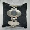 Bracelet montre mécanique en argent, modèle typique des années 1960.