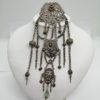 Broche de corsage, en trois parties et pampilles, argent du 19ième siècle.