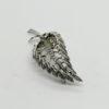 Broche argent , feuille galbée et sertie de pierres blanche. – Image 2