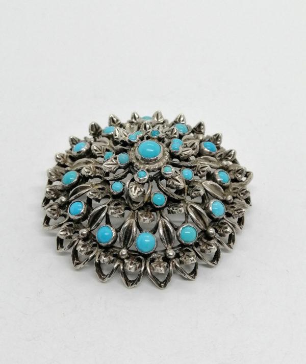 Broche/pendentif argent , ronde et ajourée, sertie de turquoises cabochons. – Image 2
