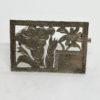 Broche argent en plaque, motifs de fleurs découpées et cartouche.