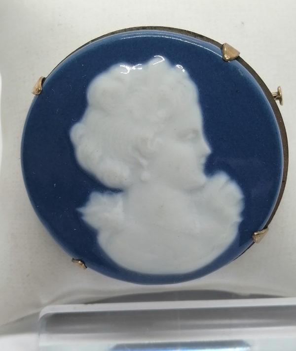Broche ronde, monture laiton , avec porcelaine de Limoges.