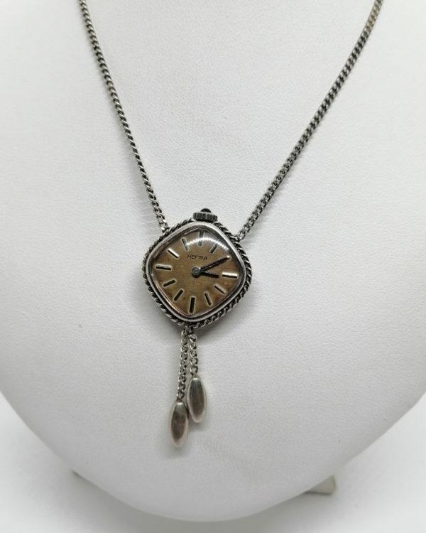 Collier argent vintage, avec montre mécanique comme pendant.