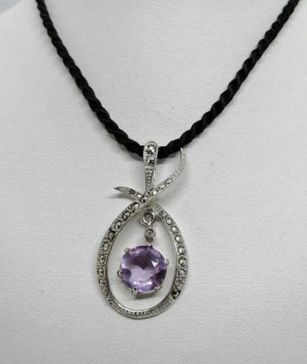 Pendentif argent, pavé de marcasites, pampille aves améthyste.
