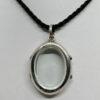 Pendentif argent, porte-photo avec verre biseauté.