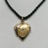 Pendentif, porte-photo de forme coeur, en plaqué or rosé.