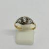 Bague en or, bicolore et ajouré, sertie saphir blanc, 1925.