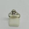 Bague en or gris, solitaire avec petit diamant, 1930-40.
