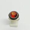 Bague argent, ronde, liseré d'émail noir et pierre de synthèse, Français vers 1925, Art Déco.