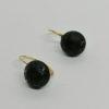 Boucles d'oreilles en or, bouton en jais, gravé d'étoiles, 1920.