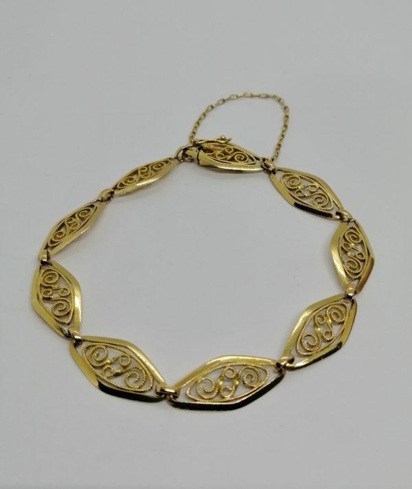 Bracelet en or jaune, maille olive filigrané, 1920-30.